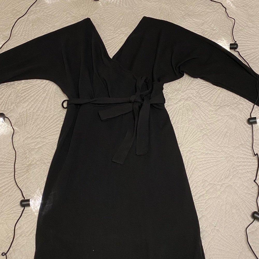 Below the knee black dress
